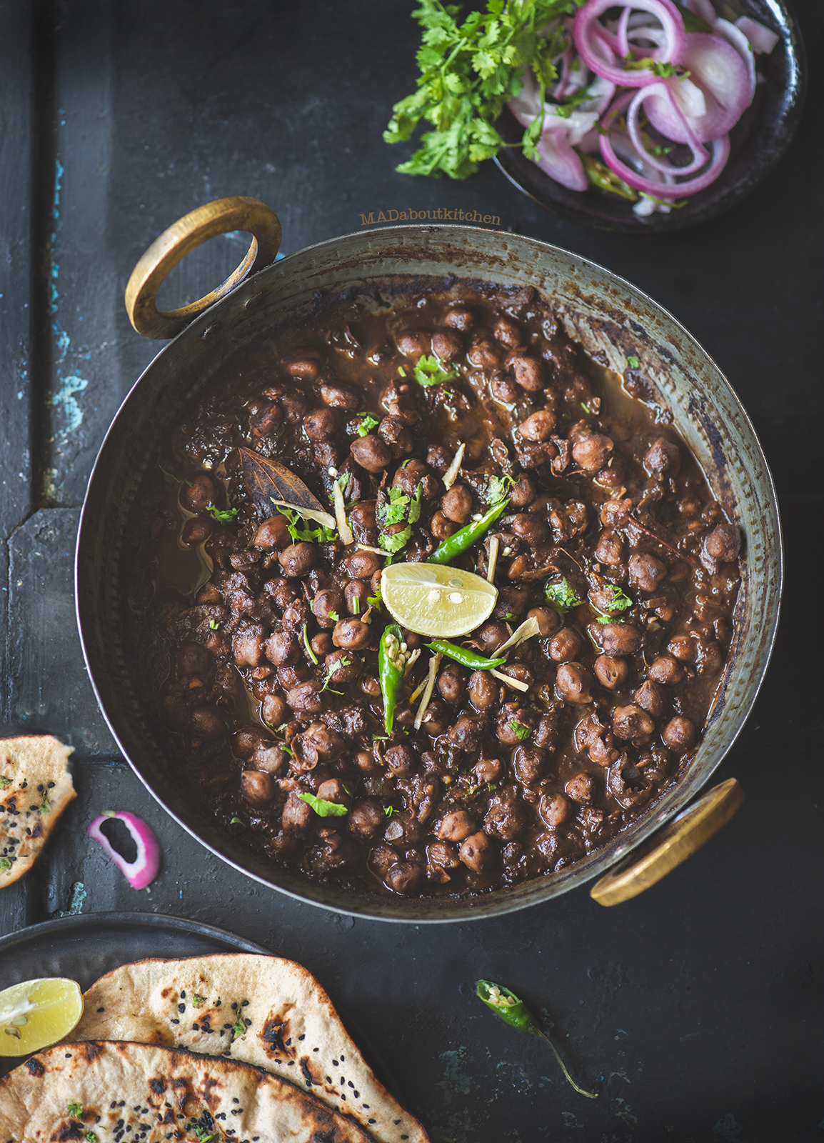 Chole is slow cooked chickpea curry in  lots of spices to make a creamy, rich curry which is served with Kulcha, Tandoori roti or Batura. 