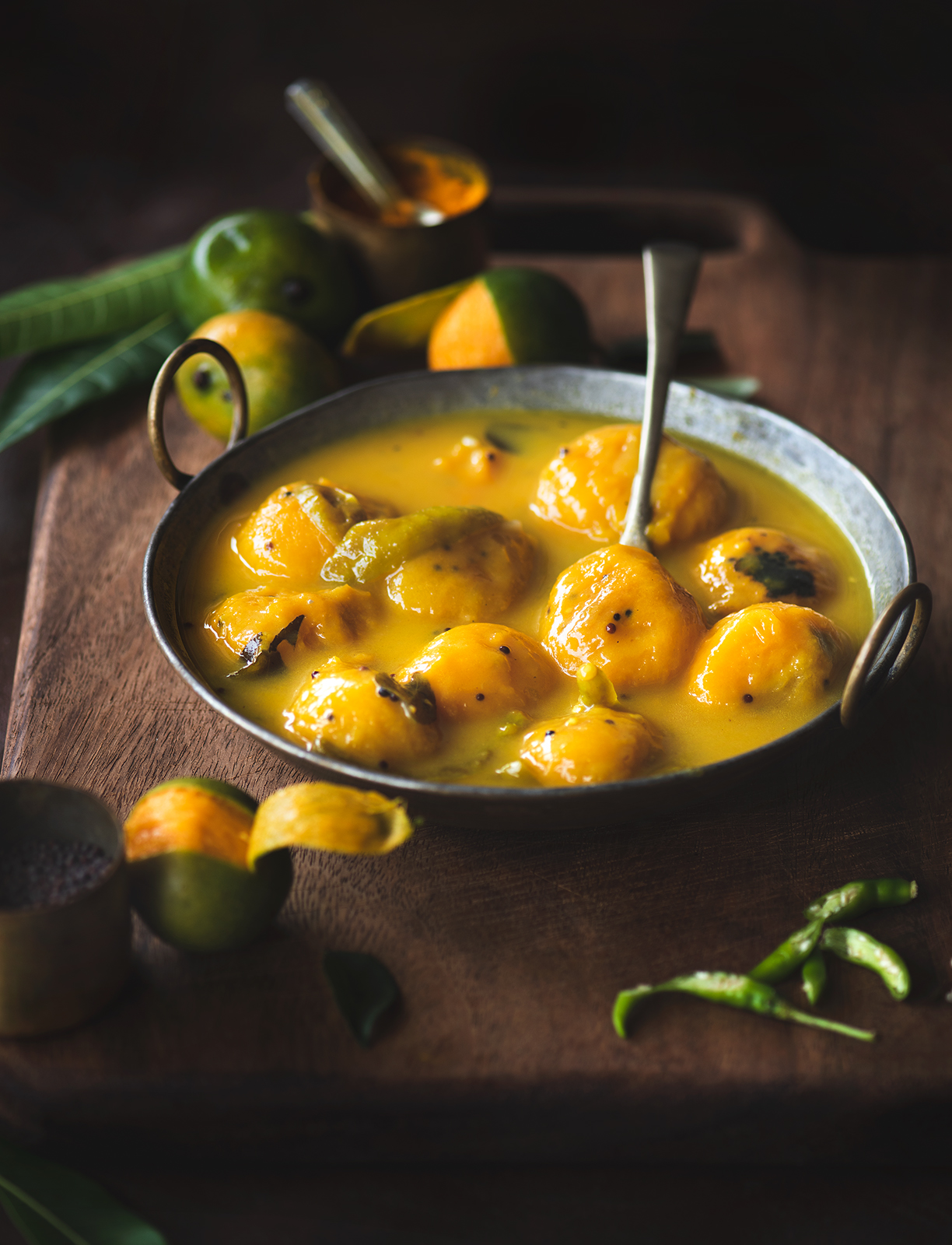 Maavina Hannu Gojju is the mango curry made using the mini mangoes called 'Sakkare guthi' . Maavina Hannu Gojju is a spicy, tangy and sweet mango curry.