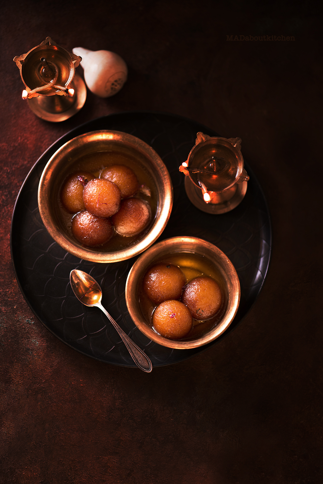 Gulab Jamun, are the most famous Indian Dessert that are deep fried balls made of Khova or reduced milk and soaked in sugar syrup till it is soft and melts in your mouth. 