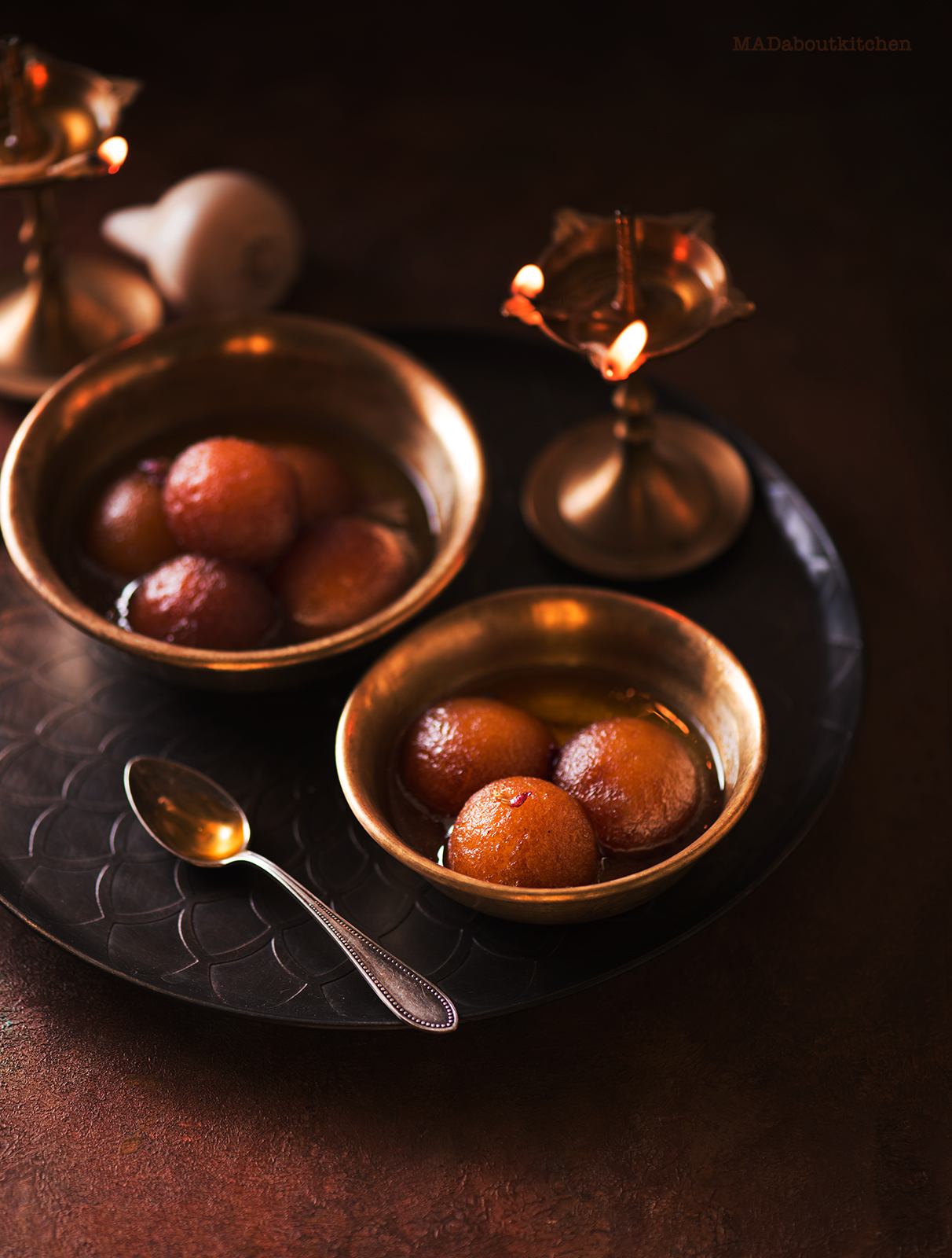 Gulab Jamun, are the most famous Indian Dessert that are deep fried balls made of Khova or reduced milk and soaked in sugar syrup till it is soft and melts in your mouth. 