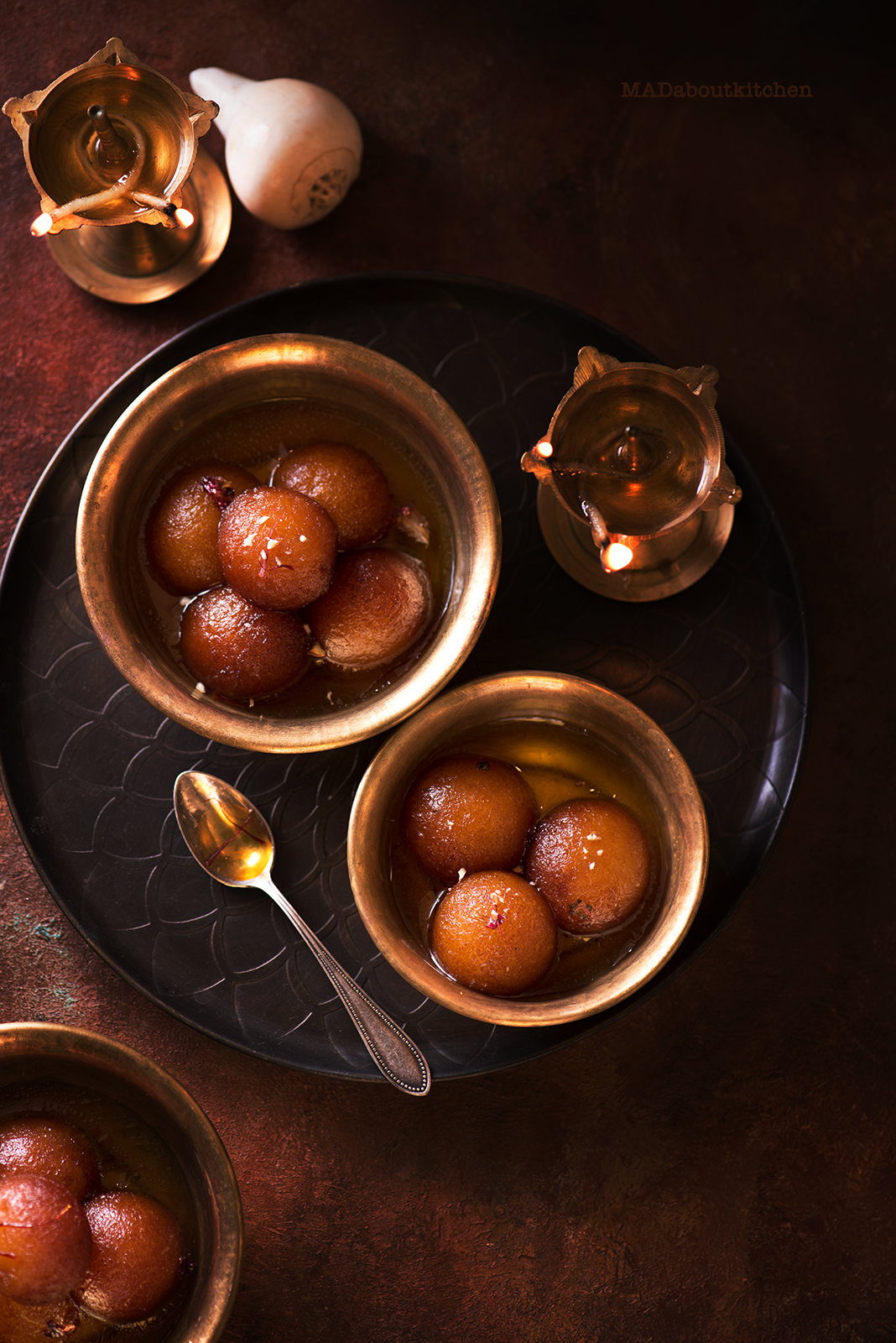 Gulab Jamun, are the most famous Indian Dessert that are deep fried balls made of Khova or reduced milk and soaked in sugar syrup till it is soft and melts in your mouth. 