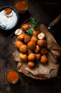 Mysore Bonda, are these small deep-fried dumplings which are crispy outside and fluffy and soft inside and is usually served with coconut chutney.