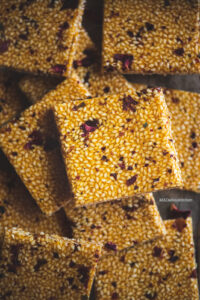 Til Gud Chikki are crisp thin wafer made using jaggery and sesame seeds is a speciality during winter months and is healthy due to the qualities of Sesame.