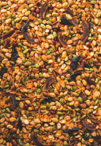 Avarekaalu mixture is one of the most addictive, loved deep fried, tea time snack from Karnataka. It is a crispy, spicy snack with a hint of sweetness.