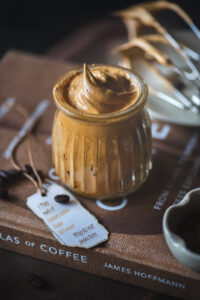 Dalgona coffee or Phentihui coffee is a whipped coffee made using instant coffee, sugar and hot water and is served hot or cold.