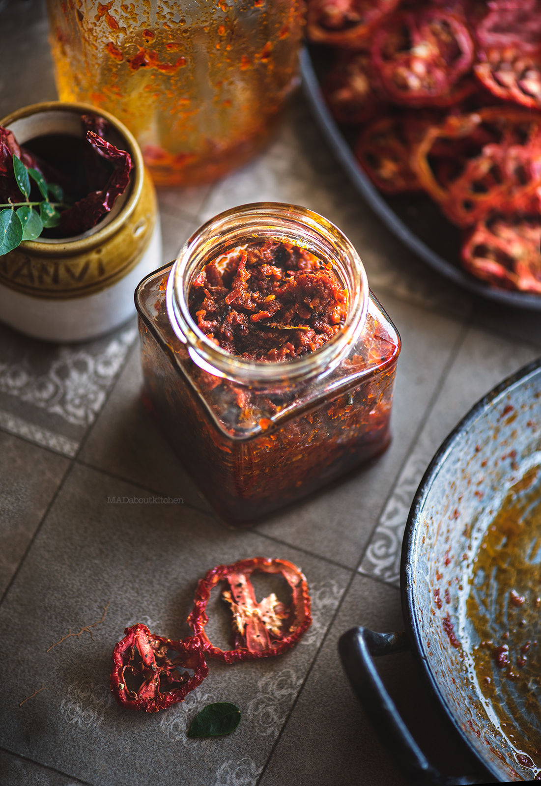 Sun-dried Tomato Pickle, Tomato Oorgaayi is a pickle made using sun-dried tomatoes during summer. It is a spicy tangy pickle with loads of garlic in it.