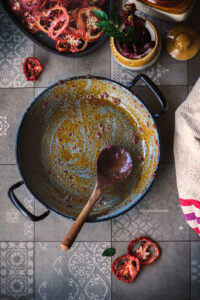 Sun-dried Tomato Pickle, Tomato Oorgaayi is a pickle made using sun-dried tomatoes during summer. It is a spicy tangy pickle with loads of garlic in it.