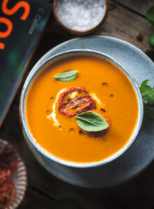Roasted Tomato Turmeric soup literally takes tossing ingredients on a pan and roasting it in the oven, blending and serving & it is as simple as that.