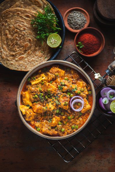 Paneer matar is cottage cheese and peas cooked in a tomato and onion gravy and flavoured with loads of spices and is one of the most common dishes in India.