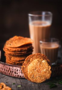 Nipattu is a very simple deep fried snack made using rice flour and other spices. It is crispy and spicy and and is super addictive.