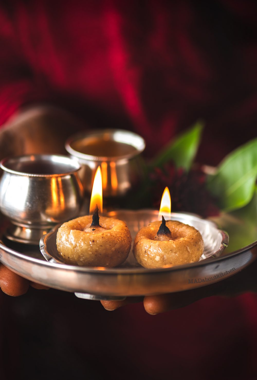 Tambittu or Akki tambittu is a rice preparation with jaggery and nuts and is offered to the god by making lamps out of them & are then served as prasada.
