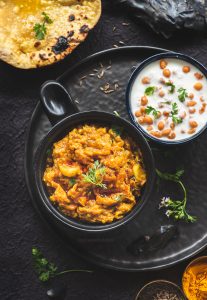 Baingan bharta is a popular Indian curry made by roasting the eggplant . The flesh of the smoky eggplant is mashed and then cooked with spices.
