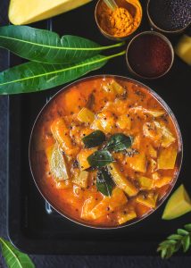 Paluvu or the raw mango curry is a lipsmacking, spicy, sweet, tangy raw & thick curry made using Tothapuri mango and can be served with almost everything.