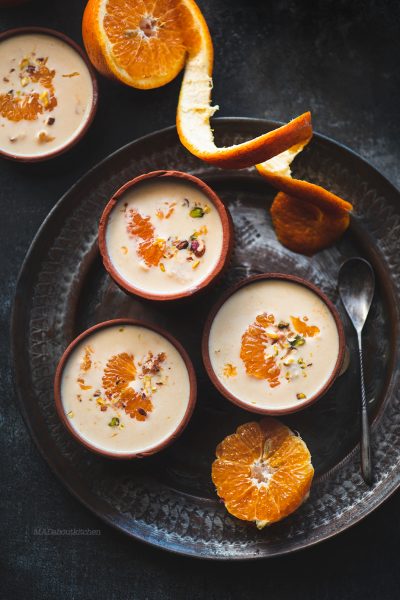 Kheer Komola is a Bengali Orange pudding, made by reducing milk and adding fresh Orange segments to it and is not only rich but also fresh.