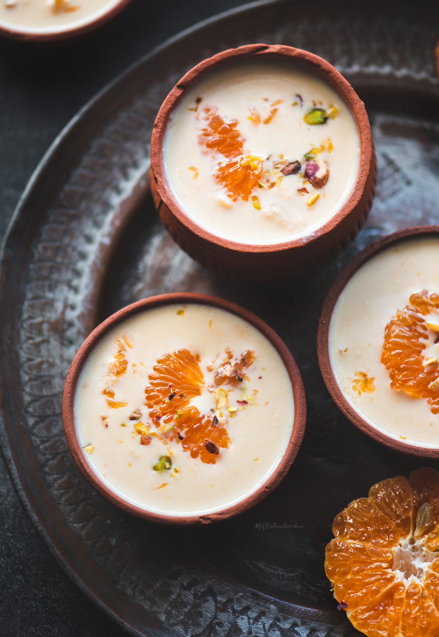 Kheer Komola is a Bengali Orange pudding, made by reducing milk and adding fresh Orange segments to it and is not only rich but also fresh.
